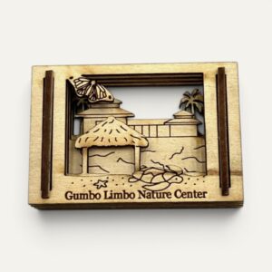 Front view of the Gumbo Limbo Nature Center FL Matchbox Miniature showing a sea turtle and thatched hut in layered wood