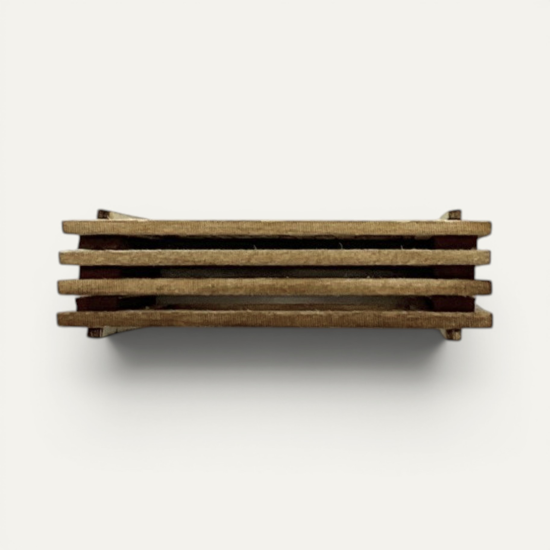 Top view of the four stacked wood layers in the Mark Twain House Matchbox Miniature