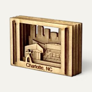 Angled view showing the four stacked wood layers of the Charlotte Matchbox Miniature