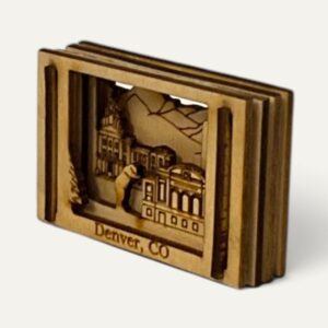 Denver, CO Matchbox Miniature turned to one side showing the bear peeking over the convention center