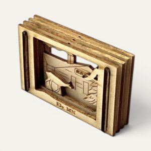 Ely, MN engraved on the base of a layered wooden Matchbox Miniature, right angle
