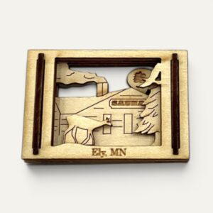 Wooden Matchbox Miniature of Ely, MN with a deer outside a sauna, front view