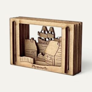 Angled view of the Plymouth, MA Matchbox Miniature showing the depth of its four wood layers